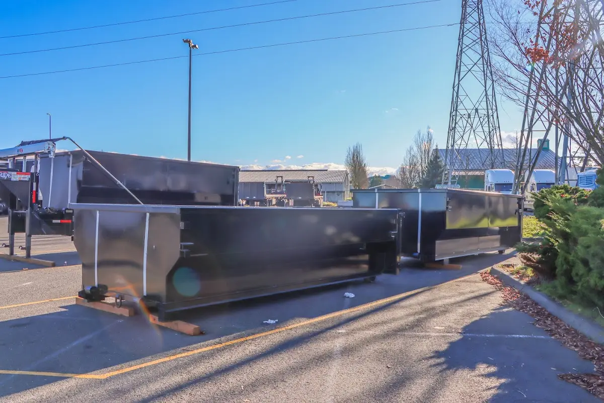 Roll-off dumpster ready for waste disposal at job site for Yard Waste Dumpster Rental in Forestville